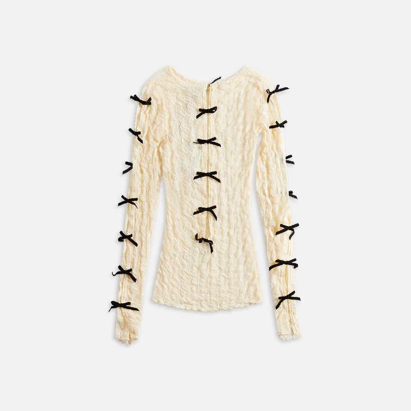 Second Skin Ross Bow Mockneck Top - Cream / Black Bows Must-have sweaters for this season