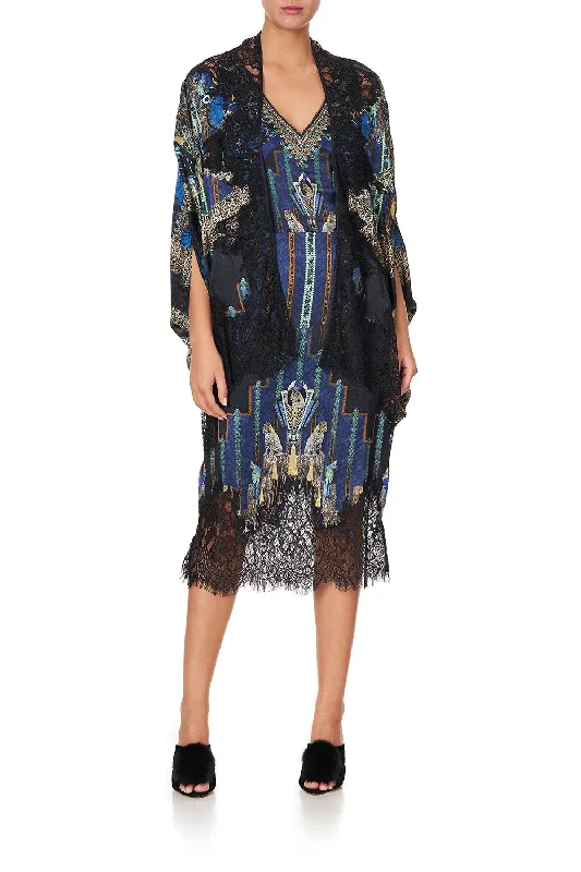 OPEN FRONT CAPE WITH LACE DRIPPING IN DECO Lace Dress Glow